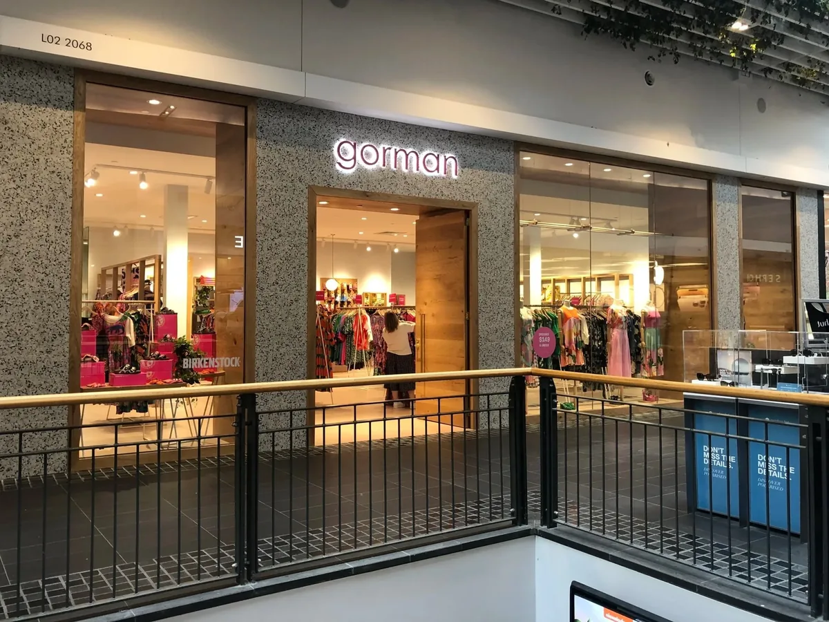Glazed shopfront to a first-floor retail tenancy with slim framing